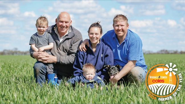 Family business: Three generations of the Ferrier family in a chickpea crop at Jil Jil in Victoria’s Mallee region. From left: Samuel, 3, John, Deanne, Charlie, 11 months, and David Ferrier. Picture: Chloe Smith