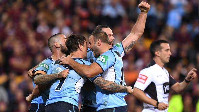 Mitchell Pearce and Blues celebrate a NSW try in State of Origin I.