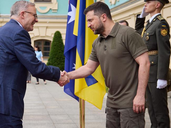 Handout photo of President of Ukraine Volodymyr Zelenskyy greets Prime Minister of Australia Anthony Albanese ahead of their meeting in Kyiv, capital of Ukraine on July 3, 2022. Photo by Ukrainian Presidency via ABACAPRESS.COM.
