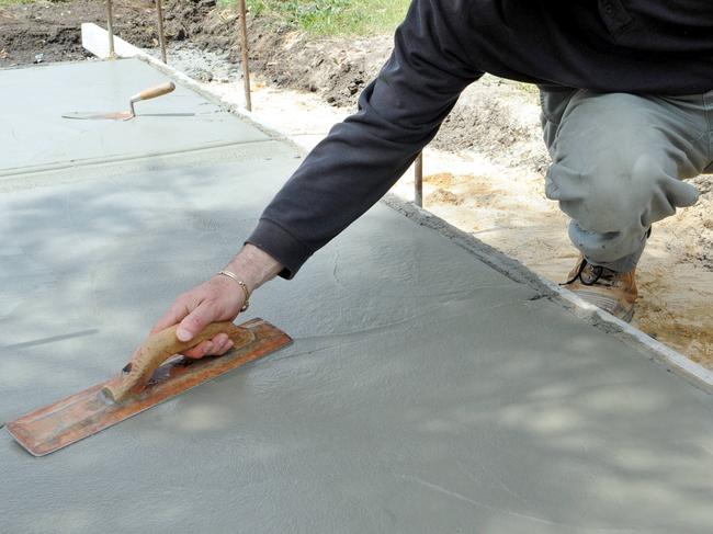 Step-by-step guide to laying a concrete path. TAFE building consultant and lecturer Joseph Bagnara prepares a footpath. Tools for the job. Finish with tools.