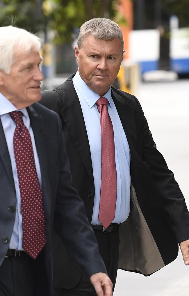 Dave Hanna (right) arrives at Brisbane District Court today. Picture: Dave Hunt/AAP