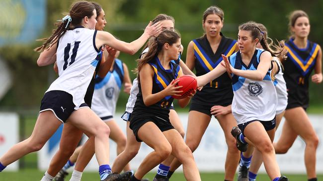 MELBOURNE, AUSTRALIA - AUGUST 10: Alice Macleod of Carey Grammar in action during the 2023 Herald Sun Shield Intermediate Girls Grand Final match between Sacred Heart College Geelong and Carey Grammar at Trevor Barker Oval on August 10, 2023 in Melbourne, Australia. (Photo by Graham Denholm/AFL Photos via Getty Images)