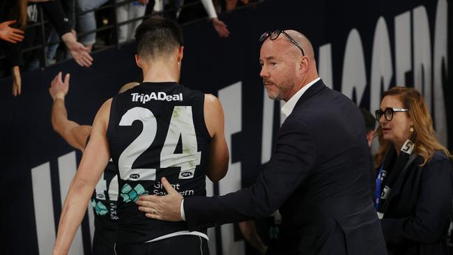 Carlton president Luke Sayers pats Nic Newman after the loss to the Western Bulldogs. Picture: Michael Klein