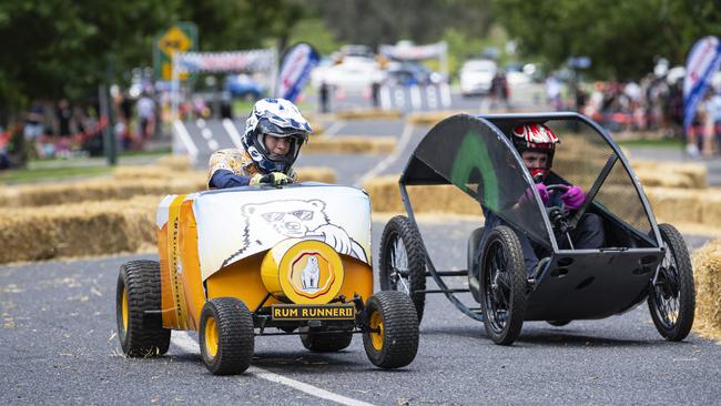 Cousins Ben Priebbenow (left) of team Rum Runners against Alex Atwell of team Wok Eye race each other in the Greenmount Billy Kart Challenge, Saturday, November 23, 2024. Picture: Kevin Farmer