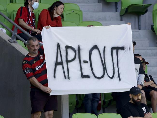 MELBOURNE, AUSTRALIA - DECEMBER 18: WSW fans hold protest signs during the round eight A-League Men's match between Western United and Western Sydney Wanderers at AAMI Park, on December 18, 2022, in Melbourne, Australia. (Photo by Jonathan DiMaggio/Getty Images)