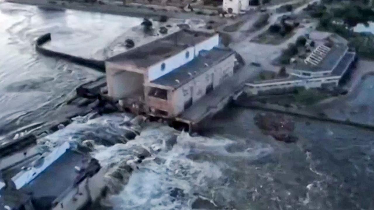 This screen grab from a video posted on Ukraine's President Volodymyr Zelensky's Twitter account shows an aerial view of the dam of the Kakhovka Hydroelectric Power Station after it was partially destroyed. Picture: AFP Photo/Twitter/Account of Ukraine's President Volodymyr Zelensky/@ZelneskyyUa