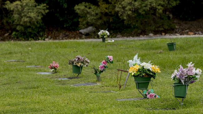 Hadyn’s gravesite should be covered over with grass, like these sites. Picture: Jerad Williams