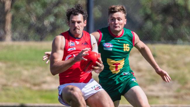 Tasmania's Riley Ashlin tries to corral his Norwood opponent. Picture: Solstice Digital