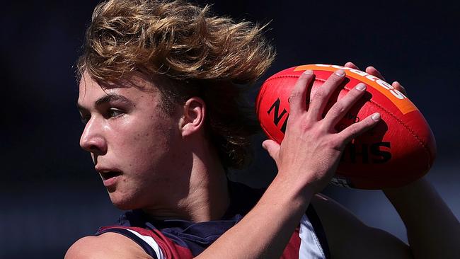 MELBOURNE, AUSTRALIA - SEPTEMBER 24: Ryley Sanders of the Dragons marks the ball during the Coates Talent League Boys Grand Final match between Sandringham Dragons  and Eastern Ranges at Ikon Park on September 24, 2023 in Melbourne, Australia. (Photo by Kelly Defina/AFL Photos/via Getty Images)