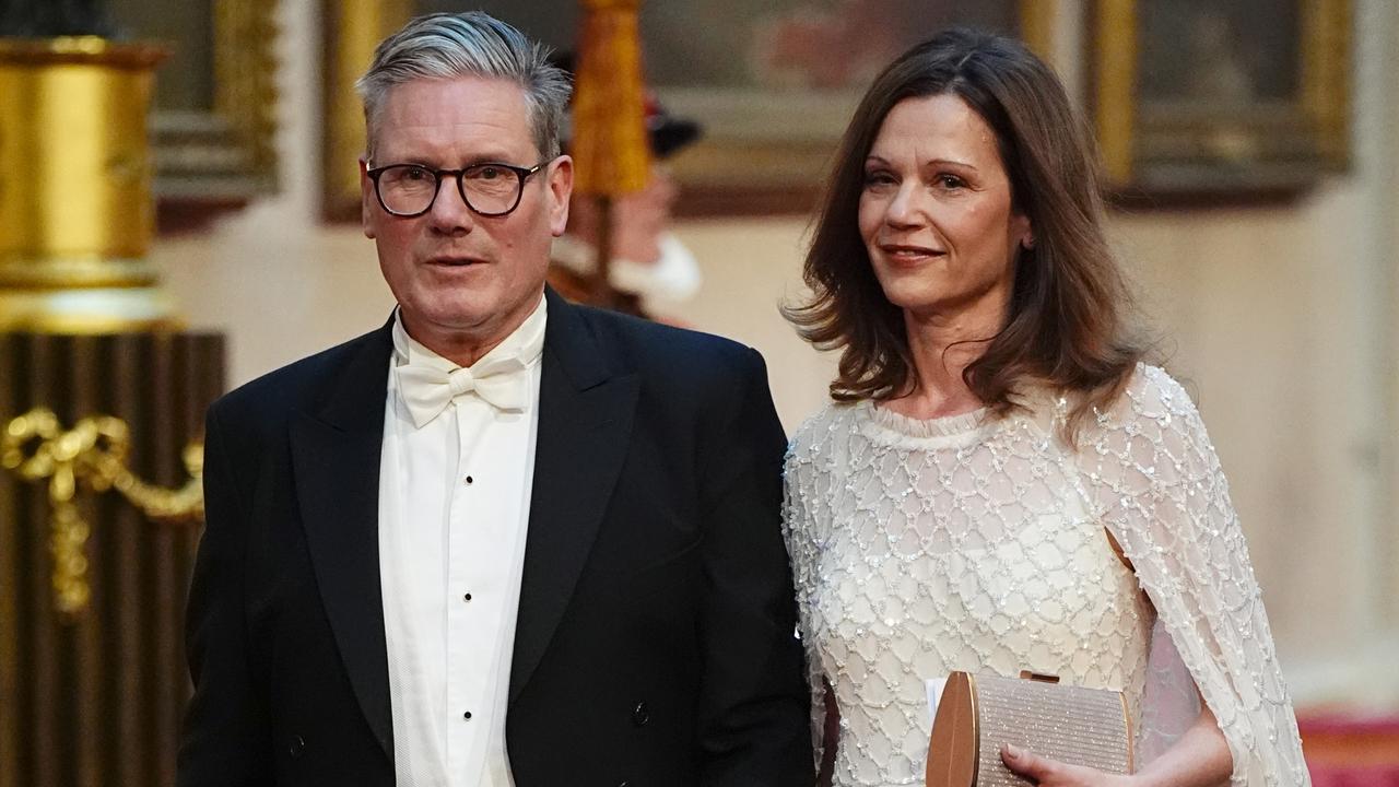 Keir Starmer with his wife Victoria Starmer make their way along the East Gallery to attend the State Banquet for Emperor Naruhito and his wife Empress Masako of Japan at Buckingham Palace on June 25, 2024. (Photo by Aaron Chown – WPA Pool/Getty Images)