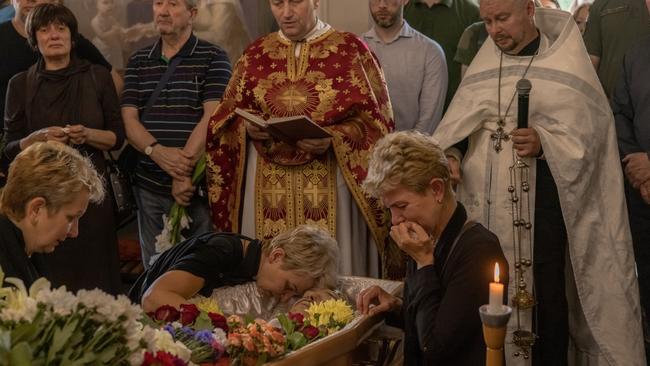 Valentyna mourns her soldier son Nazar Matlak, killed in the fighting in the Zaporizhzhia region, in Kyiv. Picture: Getty Images