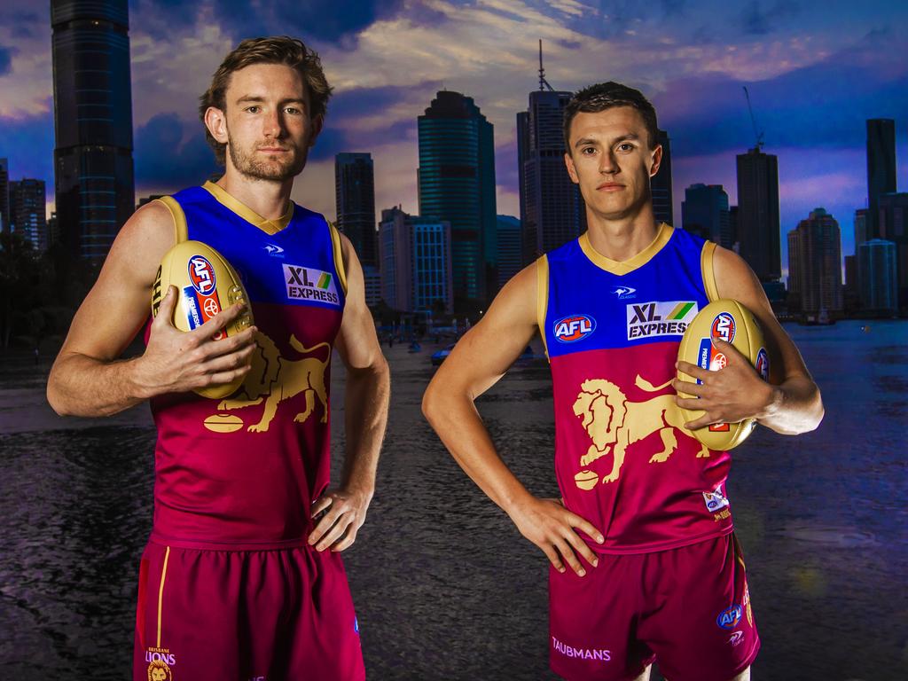 Lions stars Harris Andrews (left) and Hugh McCluggage are ready for the Demons. Picture: Nigel Hallett