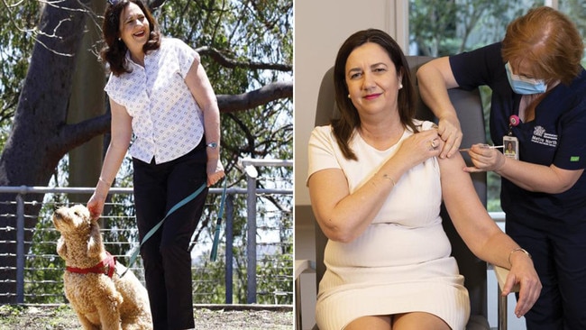 Annastacia Palaszczuk gets her Pfizer jab, and says her vaccination was delayed after he beloved dog Winton bit her, which meant she needed a tetanus shot. Pictures: News Corp