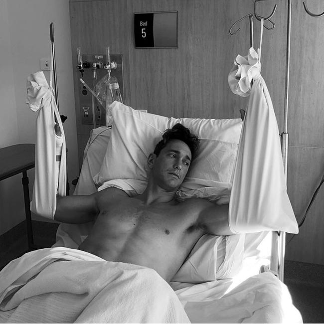 Surf life saving star Ali Day recovers in hospital after surgery on his two broken wrists. Picture: @alastairday via Instagram