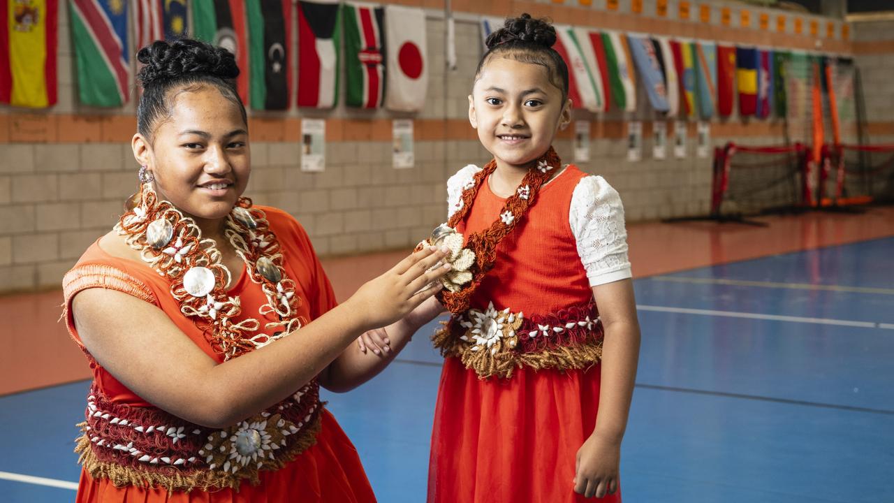 Sisters Tapaita (Yr1) and Hifo (Yr6) Leaaemanu represent Tonga at Harmony Day celebrations at Darling Heights State School. Picture: Kevin Farmer