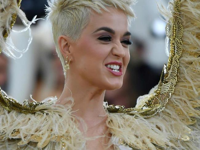 Katy Perry arrives for the 2018 Met Gala on May 7, 2018, at the Metropolitan Museum of Art in New York. The Gala raises money for the Metropolitan Museum of Art’s Costume Institute. The Gala's 2018 theme is “Heavenly Bodies: Fashion and the Catholic Imagination.” / AFP PHOTO / Angela WEISS