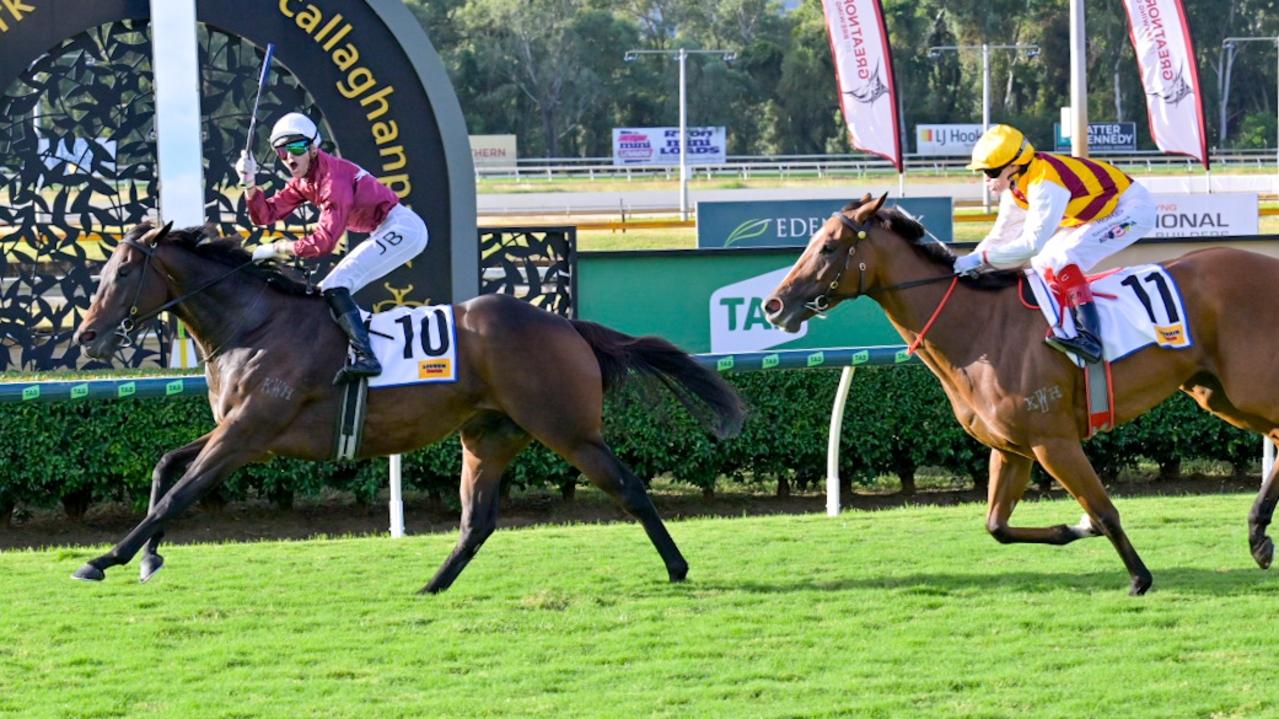 Jake Bayliss winning the $1m The Archer slot race in Rockhampton on the Matt Dunn-trained gelding Lubrication ahead of Comrade Rosa on Sunday. Picture: Matthew Harris / Caught in the Act Photography