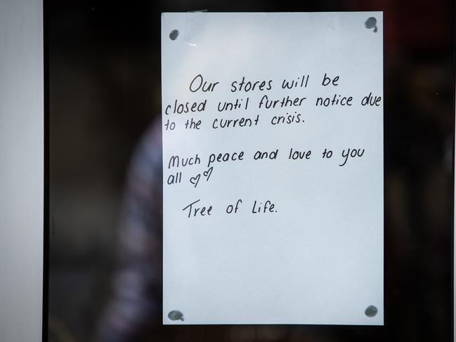 Shop note in window of Tree of Life, Manly. Picture: Julian Andrews.