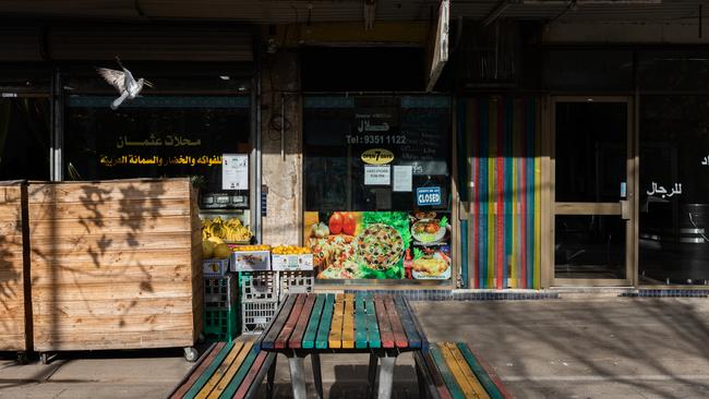 An empty bench outside a closed pizza shop in Broadmeadows. Picture: Getty