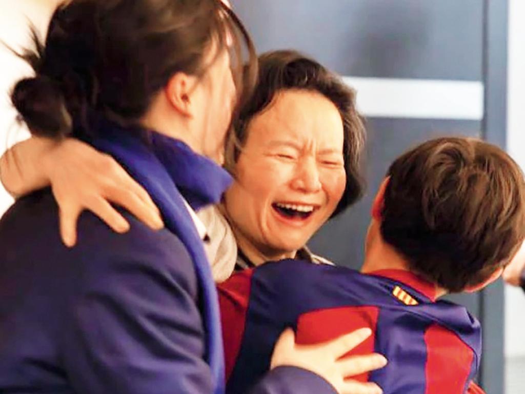 Isolated from all she held dear … Cheng Lei was reunited with her children Ava and Alex, then aged 14 and 12, at Melbourne airport on 11 October 2023. The last time she had seen them they had been 10 and eight. Photo courtesy of DFAT, Commonwealth of Australia.