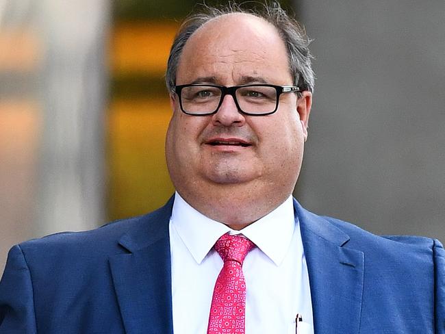 Clive Mensink, the nephew of Clive Palmer, leaves the Supreme Court in Brisbane, Wednesday, April 20, 2016. Mr Mensink Mr Mensink has asked the court to issue an injunction preventing the Queensland Nickel administrators from appointing receivers to three other Palmer nickel companies who were in a joint venture with QN. (AAP Image/Dave Hunt) NO ARCHIVING