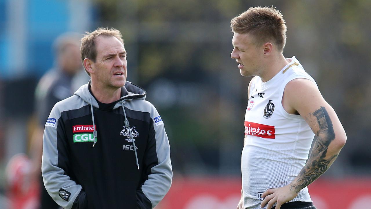 Collingwood's Jordan De Goey talks with head physio Dave Francis during training . Pic: Michael Klein.
