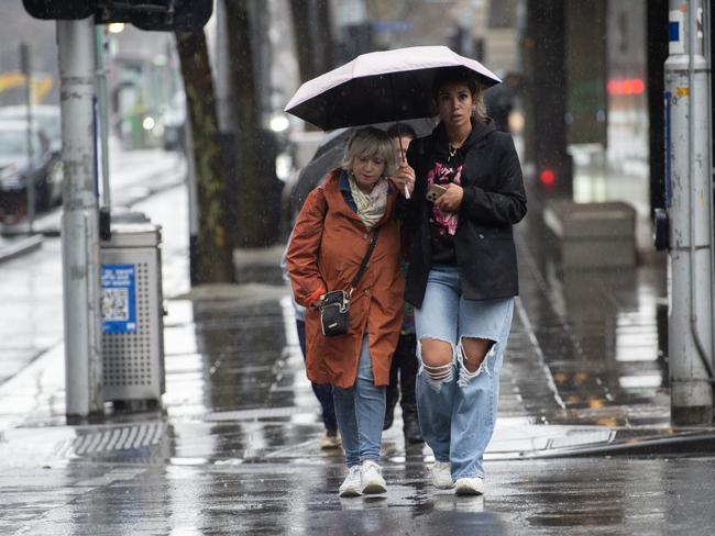 MELBOURNE AUSTRALIA - Newswire Photos JULY 9TH 2024 : Heavy rain hits Melbourne. PICTURE : Newswire / Nicki Connolly