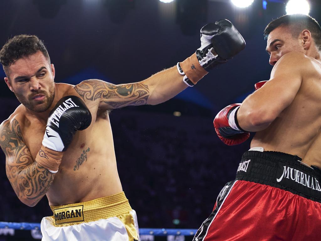 Tim Tszyu evades a shot by Bowyn Morgan. (Photo by Brett Hemmings/Getty Images)