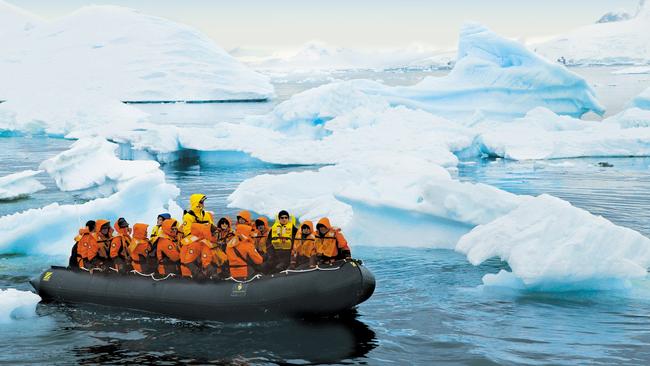 Seabourn passengers on a Zodiac excursion in Antarctica.