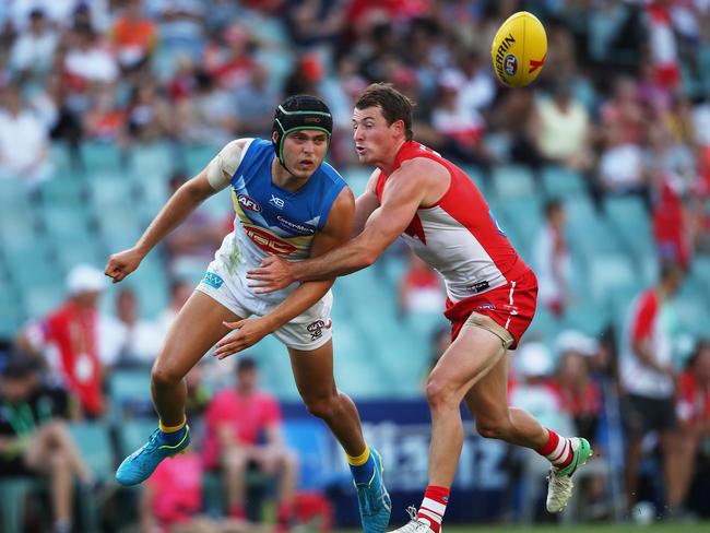 Gold Coast’s Kade Kolodjashnij wore a helmet in the opening stages of 2018 after suffering multiple concussions. Picture: Phil Hillyard.