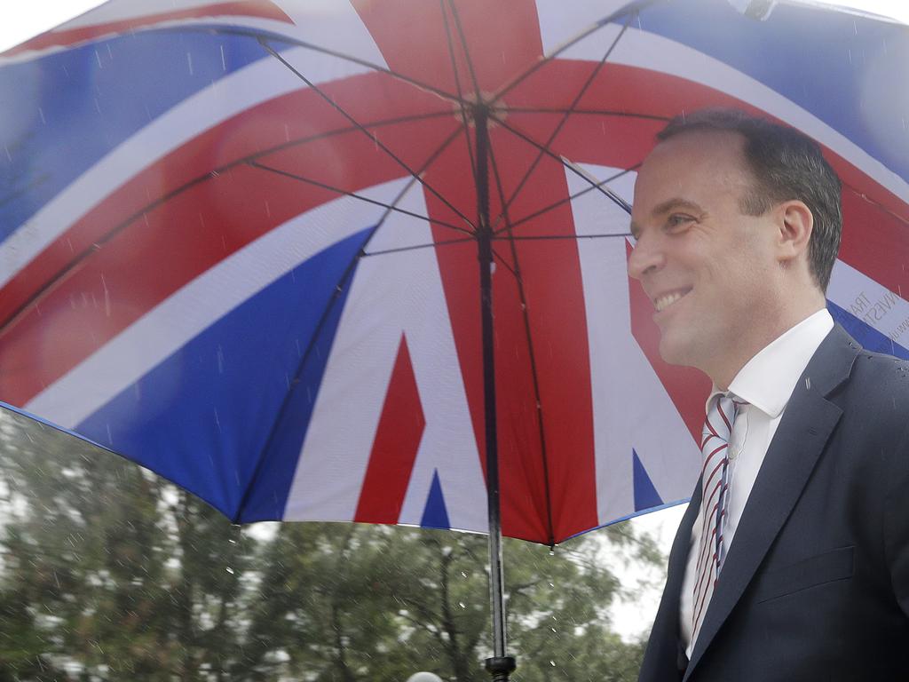 Britain’s Foreign Secretary Dominic Raab has been visiting Australia to drum up some post Brexit trade. He brought a suitable umbrella to shelter from the very British-like conditions. Picture: Rick Rycroft-Pool/Getty Images.