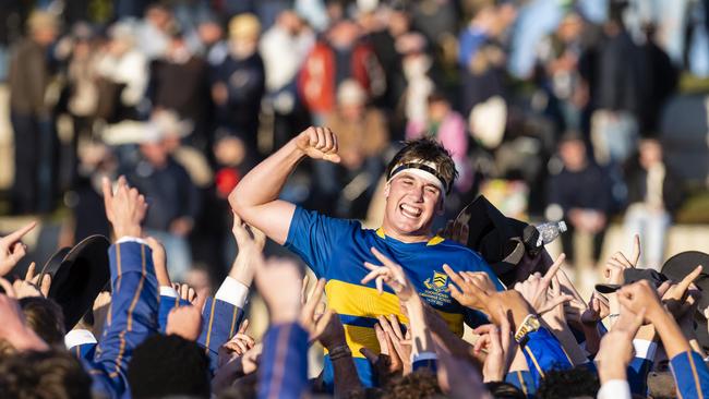 TGS First XV captain Charlie Horn is lifted by the student body in celebration after defeating Downlands to claim the O'Callaghan Cup on Grammar Downlands Day at Downlands College, Saturday, August 6, 2022. Picture: Kevin Farmer