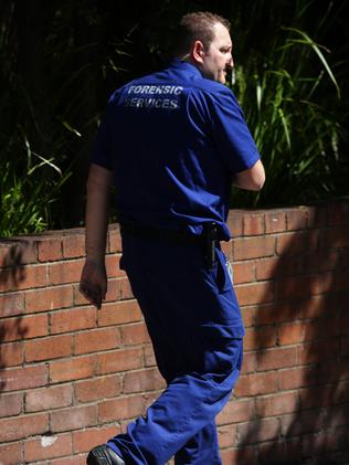 Police forensics teams at the scene. Picture: Carly Earl