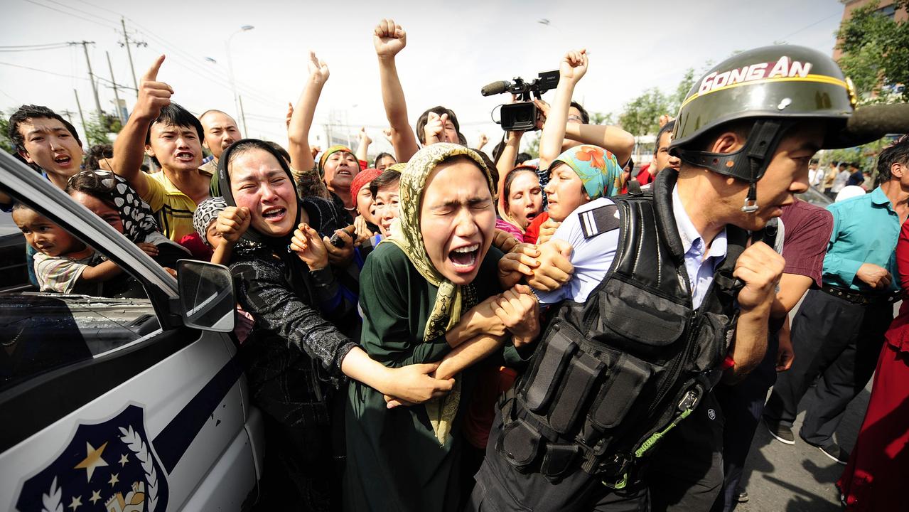 Uighur women during a protest in Urumqi in 2009. Picture: Peter Parks/AFP