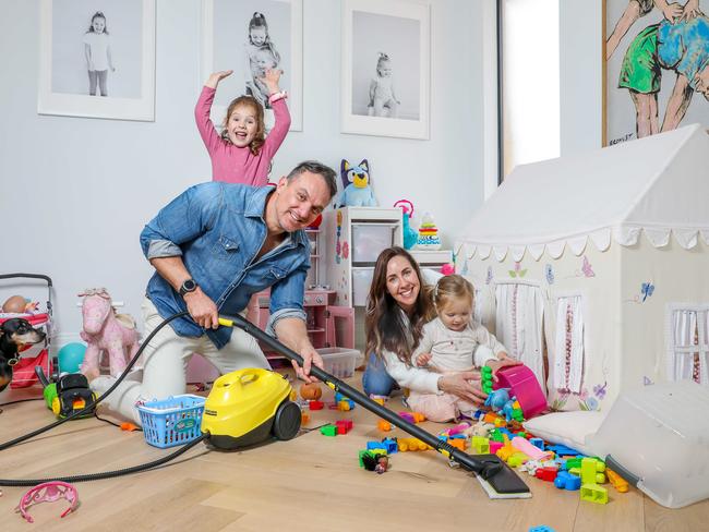 For SMARTdaily lead story. Many Australians have begun early spring cleaning in order to keep themselves entertained during lockdown. Action photos of Olga and Patrick Hemmerich and daughters Harper, 4 and Hazel, 2, doing cleaning at home. Picture: Tim Carrafa