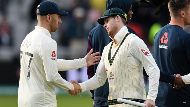 England's Jack Leach and Steve Smith. Picture: AFP