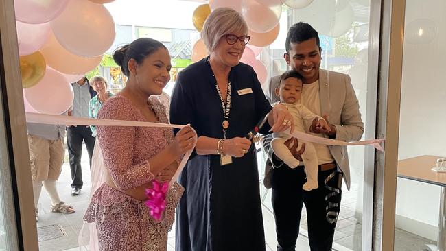 Nishika Runage, Mayor Debbie Arnott and Ravindu Kariyawasam cut the ribbon to welcome the community to their new traditional restaurant.