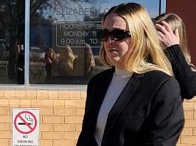 Hannah Neale leaves Elizabeth Magistrates Court after appearing on child sex charges.