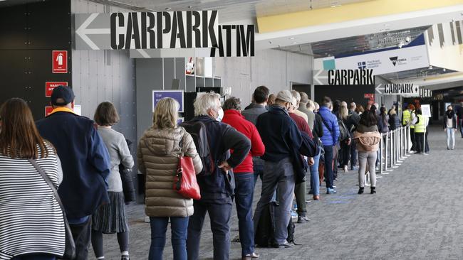 There have been long lines of people waiting to get their shot at the Melbourne Exhibition Centre Vaccination Hub. Picture: David Caird