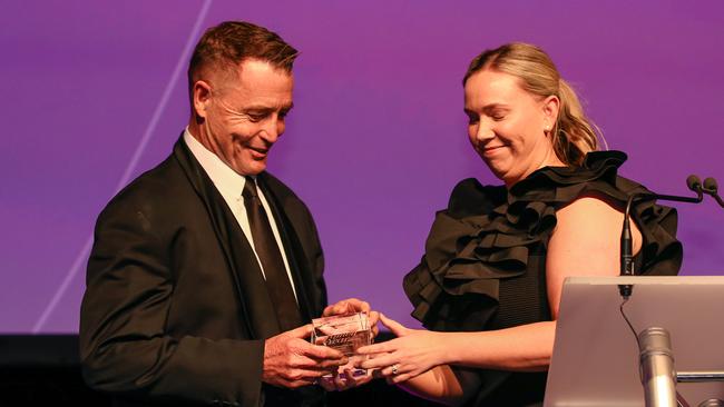 Gold Coast Titans CEO Steve Mitchell receives the Champions of Sport Award for Karyn Murphy at the 2023 Women of the Year Awards at the Star on the Gold Coast. Picture: Glenn Campbell