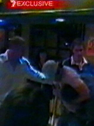 Headlock ... CCTV footage of Brendan Fevola attacking a barman in Dublin. Picture: Channel 7 News