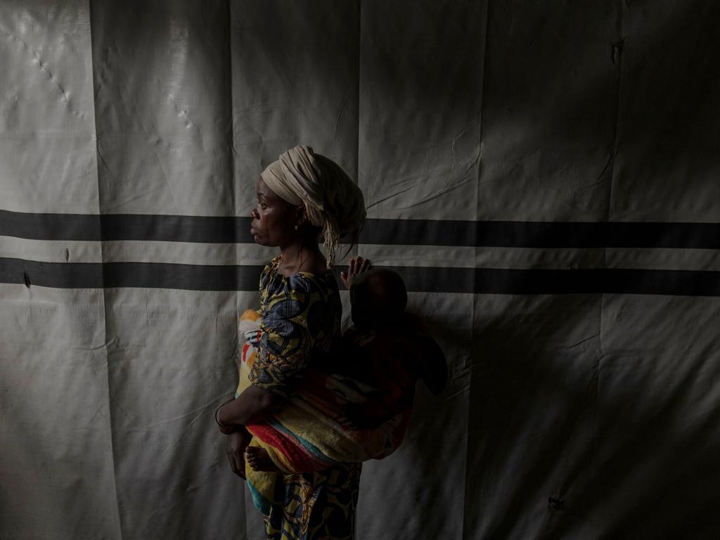 27-year-old Vumilia Migano seeks refuge with her child in Rubavu, after fleeing violence in Masisi Village, Eastern DRC, where she witnessed the tragic death of her husband. Picture: Guillem Sartorio/AFP