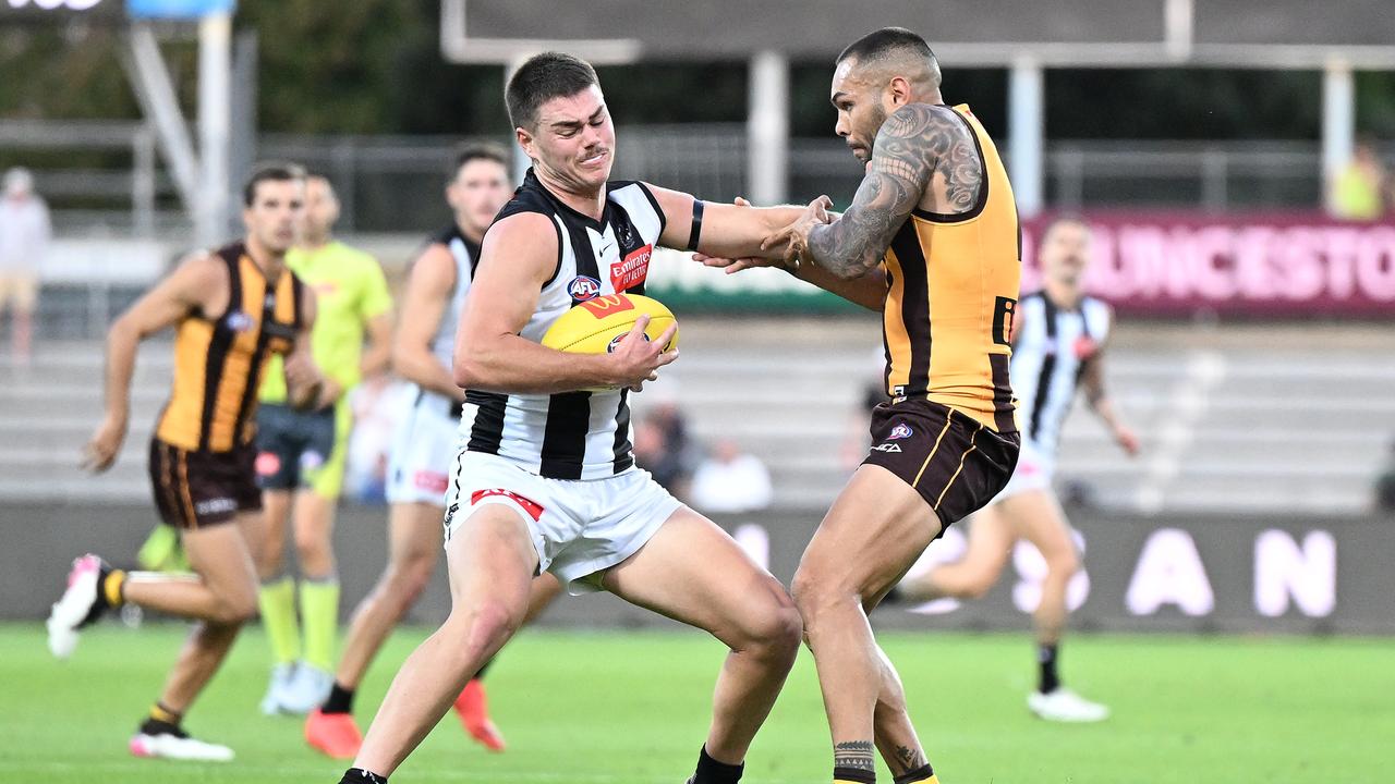 LAUNCESTON, AUSTRALIA - MARCH 02: Josh Carmichael of the Magpies is tackled by Jarman Impey of the Hawks during the AFL practice match between the Hawthorn Hawks and the Collingwood Magpies at University of Tasmania Stadium on March 02, 2023 in Launceston, Australia. (Photo by Steve Bell/Getty Images)