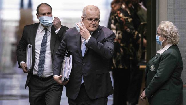 Josh Frydenberg, left, and Scott Morrison enter the House of Representatives for the first question time of the new sitting of parliament on Monday. Picture: Gary Ramage