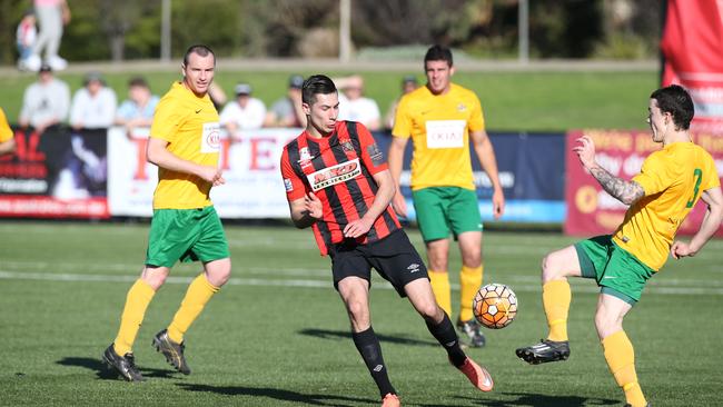 Bankstown (in the black and red) started strong but the score was equal at half time. Picture: David Swift.