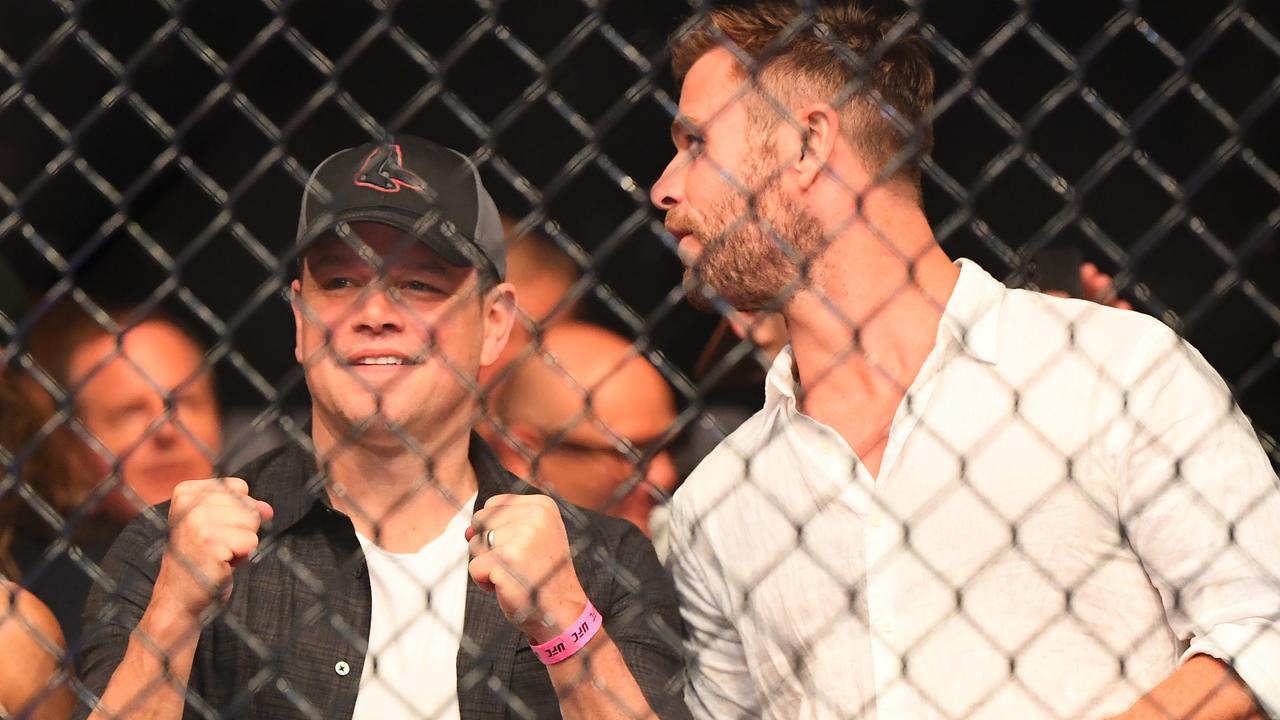 MELBOURNE, AUSTRALIA - FEBRUARY 10: Luciana Barroso, Matt Damon, and Chris Hemsworth sit ringside during UFC234 at Rod Laver Arena on February 10, 2019 in Melbourne, Australia. (Photo by Quinn Rooney/Getty Images)