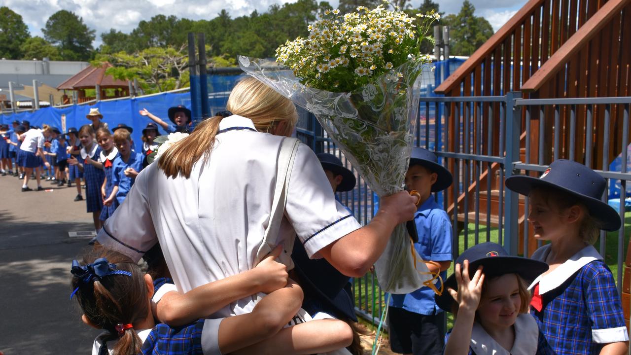 Suncoast Christian College farewells Year 12 students with a guard of honour across the campus.