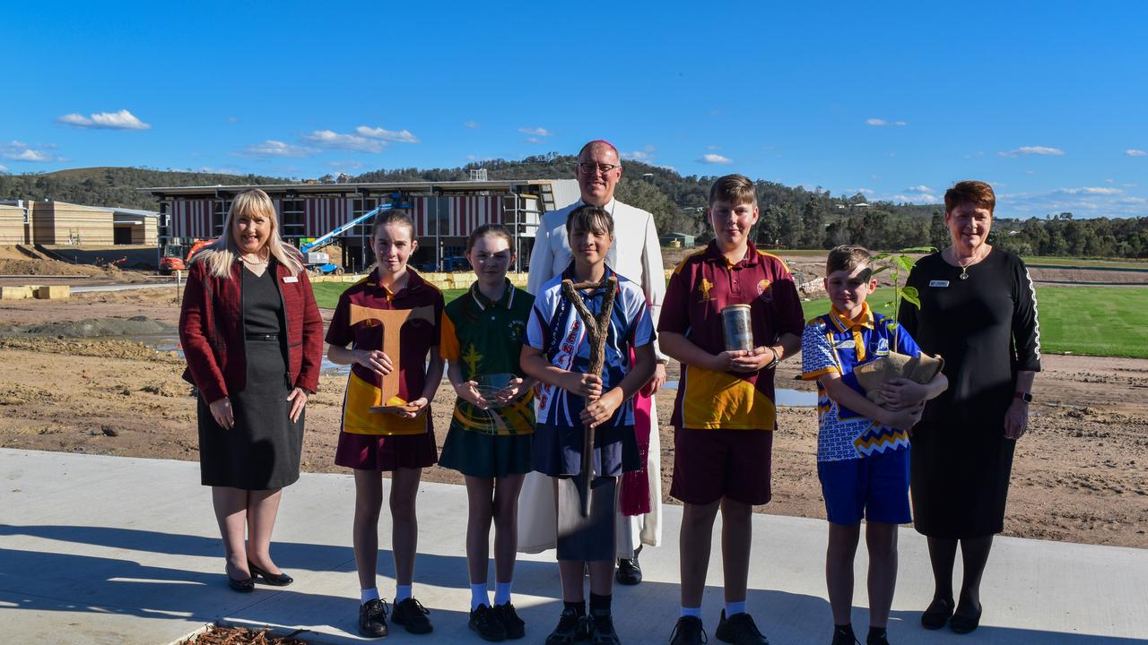 Left to right: Sophia College Principal Mrs Narelle Dobson, students Samantha Haley, Addison O'Connell, Ruby Qualischefski, Reverend Ken Howell (behind), Darius Kebbell (first student), Matthew Rasell and Ms Pam Betts