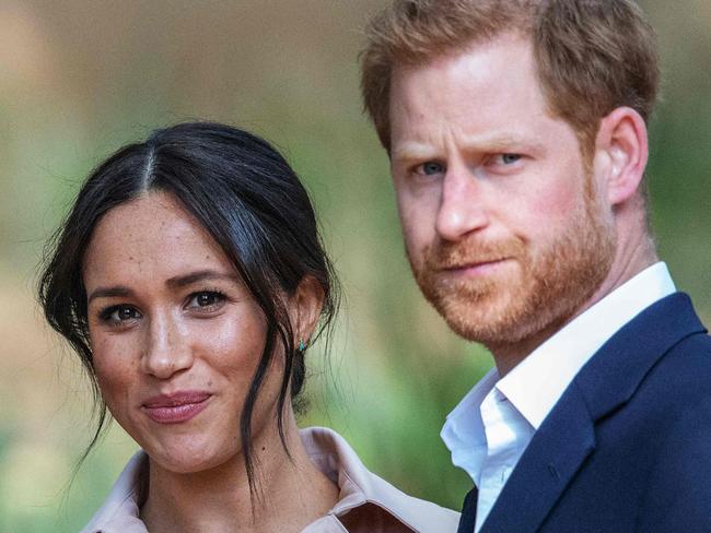 (FILES) In this file photo taken on October 02, 2019 Britain's Prince Harry, Duke of Sussex(R) and Meghan, the Duchess of Sussex(L) arrive at the British High Commissioner residency in Johannesburg where they  will meet with Graca Machel, widow of former South African president Nelson Mandela, in Johannesburg, on October 2, 2019. - Prince Harry Meghan Markle announced Sunday the birth of their daughter Lilibet Diana, who was born in California after a year of turmoil in Britain's royal family. "Lili is named after her great-grandmother, Her Majesty The Queen, whose family nickname is Lilibet. Her middle name, Diana, was chosen to honor her beloved late grandmother, The Princess of Wales," said a statement from the couple. (Photo by Michele Spatari / AFP) / France OUT until 2019-10-17T00:00:00.000+02:00