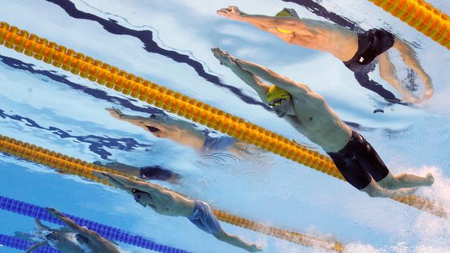 RIO DE JANEIRO, BRAZIL — AUGUST 07: (L-R) Jimmy Feigen of the United States, Odyssefs Meladinis of Greece, Marcelo Chierighini of Brazil, Clement Mignon of France and James Magnussen of Australia compete in heat two of the Men's 4 x 100m Freestyle Relay on Day 2 of the Rio 2016 Olympic Games at the Olympic Aquatics Stadium on August 7, 2016 in Rio de Janeiro, Brazil. (Photo by Adam Pretty/Getty Images)